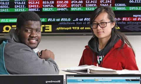 Two students in the Bloomberg lab